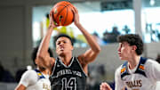 Dynamic Prep guard Ryan Hampton (14) drives to the basket during the second quarter of the City of Palms Classic signature series championship game against the Bullis Bulldogs at Suncoast Credit Union Arena in Fort Myers, Fla., on Sunday, Dec. 22, 2024.