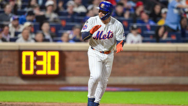 Apr 15, 2024; New York City, New York, USA; New York Mets catcher Francisco Alvarez reacts after drawing a bases loaded walk to force home a run against the Pittsburgh Pirates during the sixth inning at Citi Field. Mandatory Credit: John Jones-USA TODAY Sports