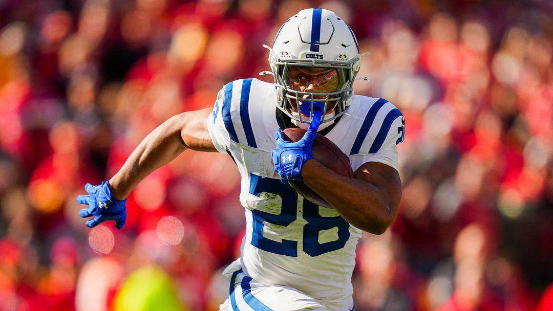 Indianapolis Colts running back Jonathan Taylor (28) runs the ball during the first half against the Kansas City Chiefs at GEHA Field at Arrowhead Stadium.