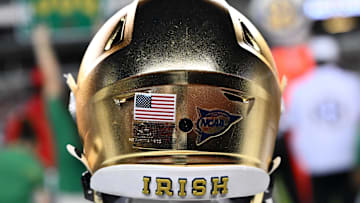 Aug 31, 2024; College Station, Texas, USA; A detailed view of Notre Dame Fighting Irish helmet on the sideline during the game against the Texas A&M Aggies at Kyle Field. Mandatory Credit: Maria Lysaker-Imagn Images