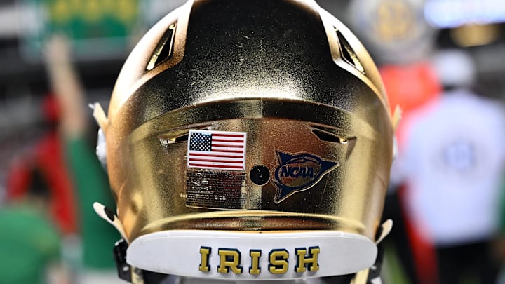 Aug 31, 2024; College Station, Texas, USA; A detailed view of Notre Dame Fighting Irish helmet on the sideline during the game against the Texas A&M Aggies at Kyle Field. Mandatory Credit: Maria Lysaker-Imagn Images