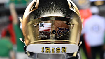 Aug 31, 2024; College Station, Texas, USA; A detailed view of Notre Dame Fighting Irish helmet on the sideline during the game against the Texas A&M Aggies at Kyle Field. Mandatory Credit: Maria Lysaker-Imagn Images