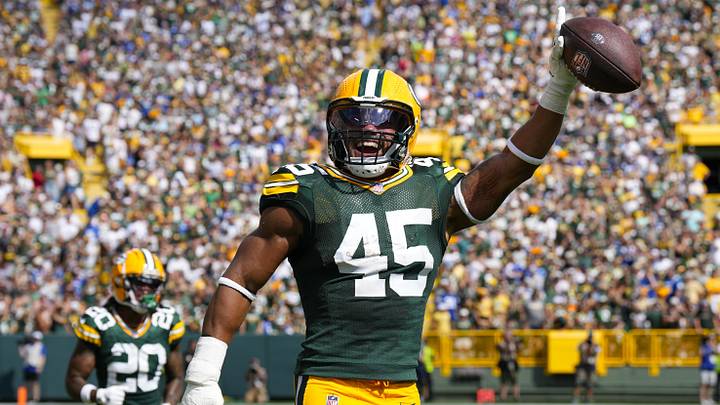 Sep 15, 2024; Green Bay, Wisconsin, USA;  Green Bay Packers linebacker Eric Wilson (45) celebrates following an interception during the fourth quarter against the Indianapolis Colts at Lambeau Field. Mandatory Credit: Jeff Hanisch-Imagn Images