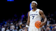 Xavier Musketeers guard Ryan Conwell (7) smiles as he picks up the ball in a timeout in the second half of the NCAA Men’s Basketball game between the Xavier Musketeers and the Jackson State Tigers at the Cintas Center at Xavier University in Cincinnati on Tuesday, Nov. 12, 2024. Xavier won 94-57.