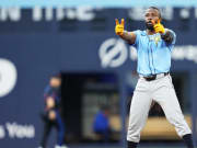 Jul 24, 2024; Toronto, Ontario, CAN; Tampa Bay Rays left fielder Randy Arozarena (56) celebrates after hitting a double against the Toronto Blue Jays during the fifth inning at Rogers Centre. Mandatory Credit: Nick Turchiaro-USA TODAY Sports