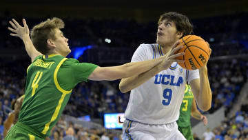 Feb 3, 2024; Los Angeles, California, USA; UCLA Bruins forward Berke Buyuktuncel (9) is fouled by Oregon Ducks guard Brennan Rigsby (4) in the first half at Pauley Pavilion presented by Wescom. Mandatory Credit: Jayne Kamin-Oncea-USA TODAY Sports