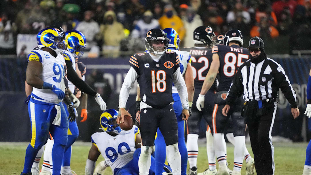 Jan 18, 2026; Chicago, IL, USA; Chicago Bears quarterback Caleb Williams (18) looks on against the Los Angeles Rams during overtime of an NFC Divisional Round game at Soldier Field. Mandatory Credit: David Banks-Imagn Images