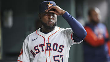 Houston Astros starting pitcher Cristian Javier (53) walks in the dugout before the game against the Oakland Athletics at Minute Maid Park.