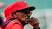 Jun 4, 2025; Boston, Massachusetts, USA; Los Angeles Angels manager Ron Washington (37) watches from the dugout against the Boston Red Sox in the first inning at Fenway Park. Mandatory Credit: David Butler II-Imagn Images