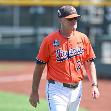 Jun 16, 2024; Omaha, NE, USA;  Virginia Cavalier head coach Brian O'Connor walks off the field after the loss against the Florida State Seminoles at Charles Schwab Field Omaha. Mandatory Credit: Steven Branscombe-Imagn Images