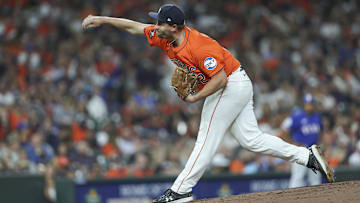 Apr 12, 2024; Houston, Texas, USA; Houston Astros relief pitcher Joel Kuhnel (72) delivers a pitch during the fifth inning against the Texas Rangers at Minute Maid Park. Mandatory Credit: Troy Taormina-USA TODAY Sports