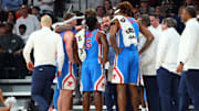 Jan 18, 2025; Starkville, Mississippi, USA; Mississippi Rebels head coach Chris Beard huddles with his team during the first half against the Mississippi State Bulldogs at Humphrey Coliseum. Mandatory Credit: Petre Thomas-Imagn Images