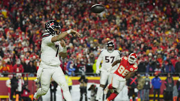 Jan 18, 2025; Kansas City, Missouri, USA; Houston Texans quarterback C.J. Stroud (7) throws on the run against the Kansas City Chiefs during the fourth quarter of a 2025 AFC divisional round game at GEHA Field at Arrowhead Stadium. Mandatory Credit: Jay Biggerstaff-Imagn Images