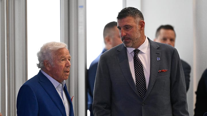 Jan 13, 2025; Foxborough, MA, USA; New England Patriots owner Robert Kraft (left) and Mike Vrabel (right) wait for the start of a press conference at Gillette Stadium where Vrabel was introduced as the New England Patriots head coach. Mandatory Credit: Eric Canha-Imagn Images