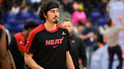 Mar 31, 2025; Washington, District of Columbia, USA; Miami Heat guard Jaime Jaquez Jr. (11) warms up prior to the game against against the Washington Wizards at Capital One Arena. Mandatory Credit: Reggie Hildred-Imagn Images