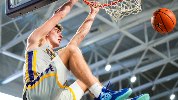 Montverde Academy Eagles forward Trent Sisley dunks the ball during the fourth quarter of the City of Palms Classic semifinal game against the Oak Ridge Pioneers at Suncoast Credit Union Arena in Fort Myers, Fla., on Saturday, Dec. 21, 2024. The Eagles remain the No. 1 team in Central Florida. Montverde Academy Eagles forward Trent Sisley dunks the ball during the fourth quarter of the City of Palms Classic semifinal game against the Oak Ridge Pioneers at Suncoast Credit Union Arena in Fort Myers, Fla., on Saturday, Dec. 21, 2024. The Eagles remain the No. 1 team in Central Florida.