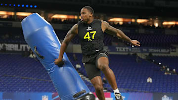Boston College defensive lineman Donovan Ezeiruaku participates in drills during the 2025 NFL Combine.