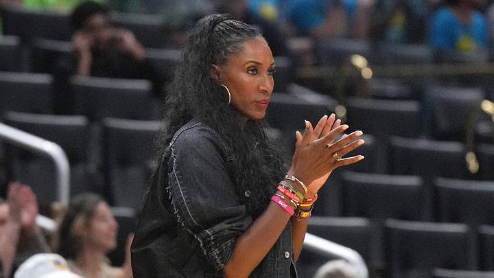 Jul 16, 2024; Los Angeles, California, USA; LA Sparks former center Lisa Leslie watches during the game against the Seattle Storm at Crypto.com Arena. Mandatory Credit: Kirby Lee-Imagn Images