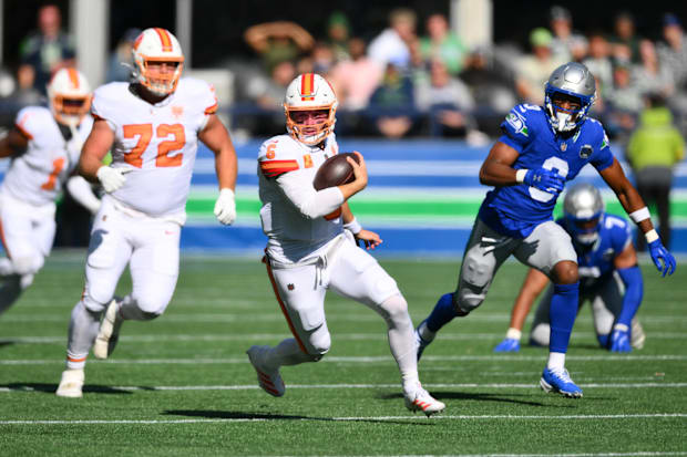 Tampa Bay Buccaneers quarterback Baker Mayfield (6) scrambles