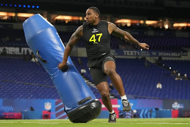 Boston College defensive lineman Donovan Ezeiruaku participates in drills during the 2025 NFL Combine.
