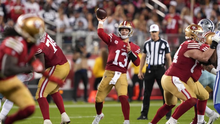 Oct 8, 2023; Santa Clara, California, USA; San Francisco 49ers quarterback Brock Purdy (13) throws a pass against the Dallas Cowboys during the third quarter at Levi's Stadium. Mandatory Credit: Darren Yamashita-USA TODAY Sports