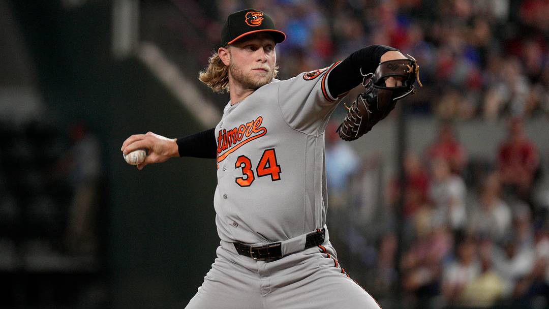 Aug 7, 2026; Arlington, Texas, USA;  Baltimore Orioles pitcher Shane Baz (34) throws to the plate against the Texas Rangers during the first inning at Globe Life Field. Mandatory Credit: Raymond Carlin III-Imagn Images