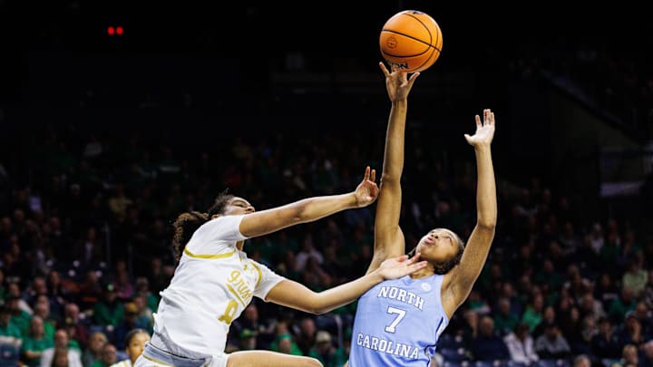 North Carolina guard Nyla Brooks (7) knocks the ball out of the hands of Notre Dame guard Cassandre Prosper, left, during an NCAA women's basketball game at Purcell Pavilion on Sunday, Jan. 11, 2026, in South Bend.