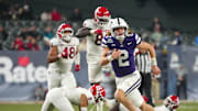 Kansas State quarterback Avery Johnson (2) scrambles against Rutgers during second half of the Rate Bowl at Chase Field on Dec. 26, 2024, in Phoenix.