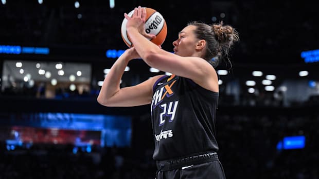 A photo of Kathryn Westbeld shooting the ball