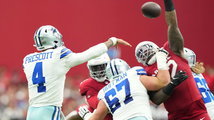 Dallas Cowboys quarterback Dak Prescott, center Brock Hoffman