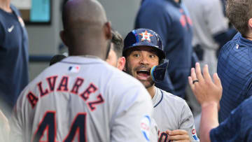 Jul 2, 2024; Toronto, Ontario, CAN;  Houston Astros second baseman Jose Altuve (27) celebrates in the dugout after left fielder Yordan Alvarez (44) hit a three-run home run against the Toronto Blue Jays in the fifth inning at Rogers Centre. 