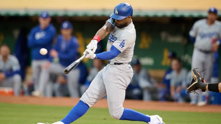 Aug 2, 2024; Oakland, California, USA; Los Angeles Dodgers outfielder Amed Rosario (27) bats against the Oakland Athletics during the third inning at Oakland-Alameda County Coliseum. Mandatory Credit: Robert Edwards-USA TODAY Sports