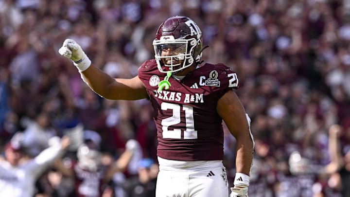 Dec 20, 2025; College Station, TX, USA; Texas A&M Aggies linebacker Taurean York (21) celebrates during the game between the Aggies and the Hurricanes at Kyle Field. Mandatory Credit: Jerome Miron-Imagn Images