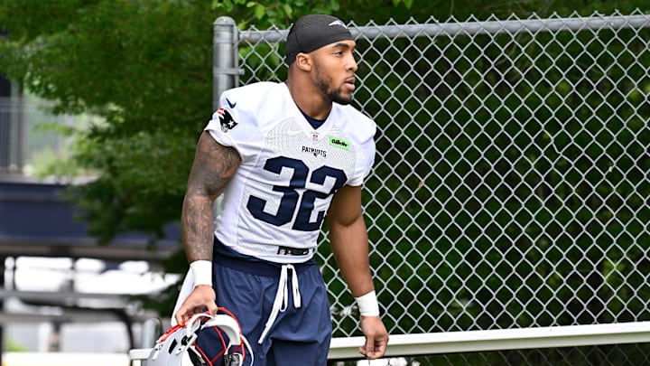 Jun 9, 2025; Foxborough, MA, USA; New England Patriots running back TreVeyon Henderson (32) walks to the practice fields at Gillette Stadium. Mandatory Credit: Eric Canha-Imagn Images