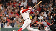 Sep 2, 2025; Boston, Massachusetts, USA;  Boston Red Sox third baseman Alex Bregman (2) hits a one run RBI during the eighth inning against the Cleveland Guardians at Fenway Park. Mandatory Credit: Eric Canha-Imagn Images