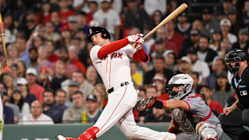 Sep 2, 2025; Boston, Massachusetts, USA;  Boston Red Sox third baseman Alex Bregman (2) hits a one run RBI during the eighth inning against the Cleveland Guardians at Fenway Park. Mandatory Credit: Eric Canha-Imagn Images