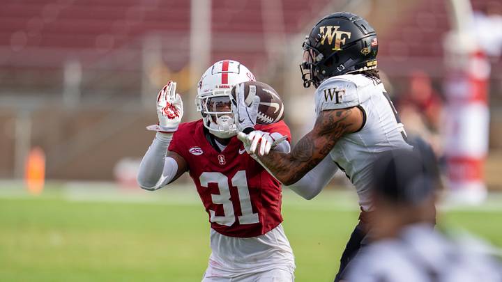 Oct 26, 2024; Stanford, California, USA;  Stanford Cardinal cornerback Aaron Morris (31) breaks up a pass to Wake Forest Demon Deacons wide receiver Horatio Fields (5) during the third quarter at Stanford Stadium. Mandatory Credit: Neville E. Guard-Imagn Images