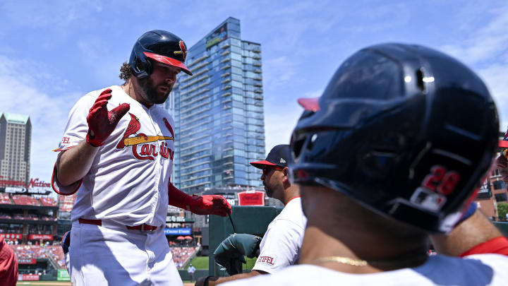 Jul 14, 2024; St. Louis, Missouri, USA;  St. Louis Cardinals right fielder Alec Burleson (41) celebrates with teammates after hitting a solo home run against the Chicago Cubs during the sixth inning at Busch Stadium.