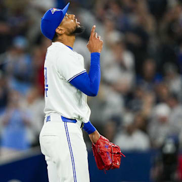 Jun 29, 2024; Toronto, Ontario, CAN; Toronto Blue Jays pitcher Jose Cuas (74) points to the sky after defeating the New York Yankees at Rogers Centre