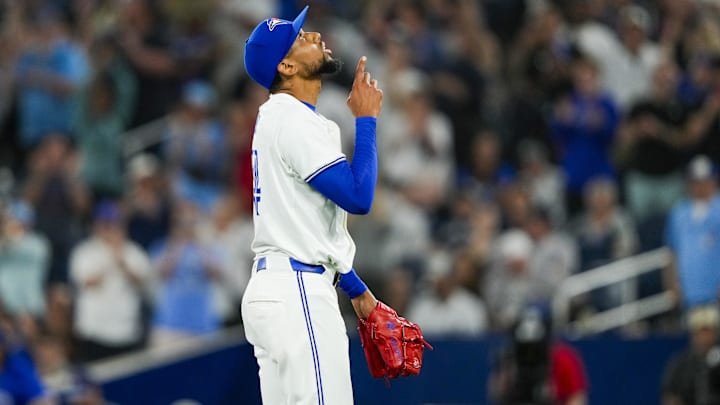 Jun 29, 2024; Toronto, Ontario, CAN; Toronto Blue Jays pitcher Jose Cuas (74) points to the sky after defeating the New York Yankees at Rogers Centre