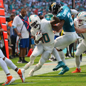 Jacksonville Jaguars cornerback Tyson Campbell (3) drives Miami Dolphins wide receiver Tyreek Hill (10) out of bounds in the second quarter at Hard Rock Stadium.