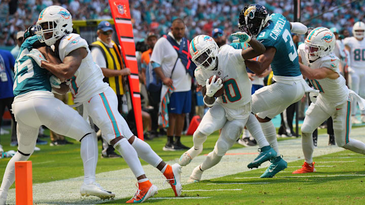 Jacksonville Jaguars cornerback Tyson Campbell (3) drives Miami Dolphins wide receiver Tyreek Hill (10) out of bounds in the second quarter at Hard Rock Stadium.