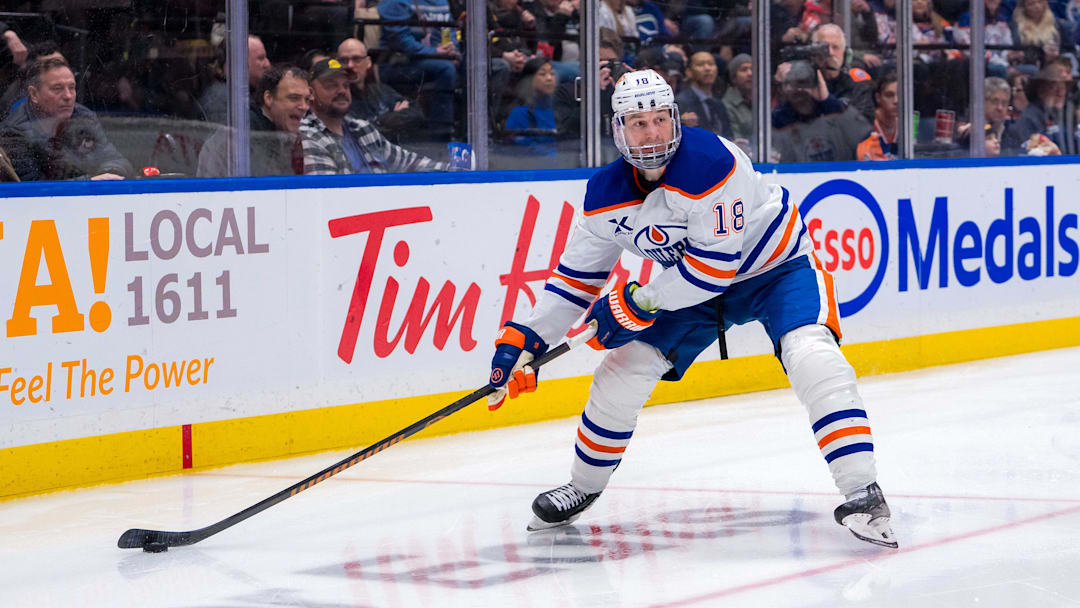 Edmonton Oilers forward Zach Hyman (18) handles the puck at Rogers Arena. Mandatory Credit: Bob Frid-Imagn Images