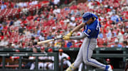 Jun 5, 2025; St. Louis, Missouri, USA;  Kansas City Royals right fielder Jac Caglianone (14) hits a one run double against the St. Louis Cardinals for his first Major League hit during the fourth inning at Busch Stadium. Mandatory Credit: Jeff Curry-Imagn Images