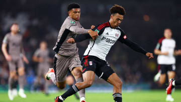 Dane Scarlett tussling with Antonee Robinson for the ball in the League Cup last August - Fulham v Tottenham Hotspur - Carabao Cup Second Round