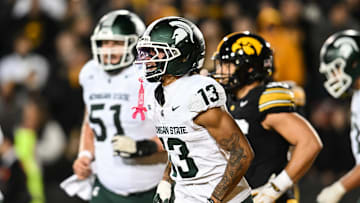 Nov 22, 2025; Iowa City, Iowa, USA; Michigan State Spartans wide receiver Chrishon McCray (13) reacts after a touchdown during the third quarter against the Iowa Hawkeyes at Kinnick Stadium. Mandatory Credit: Jeffrey Becker-Imagn Images