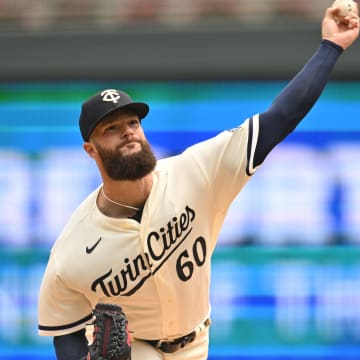 Minnesota Twins starting pitcher Dallas Keuchel (60) throws a pitch against the Pittsburgh Pirates during the third inning at Target Field in 2023.