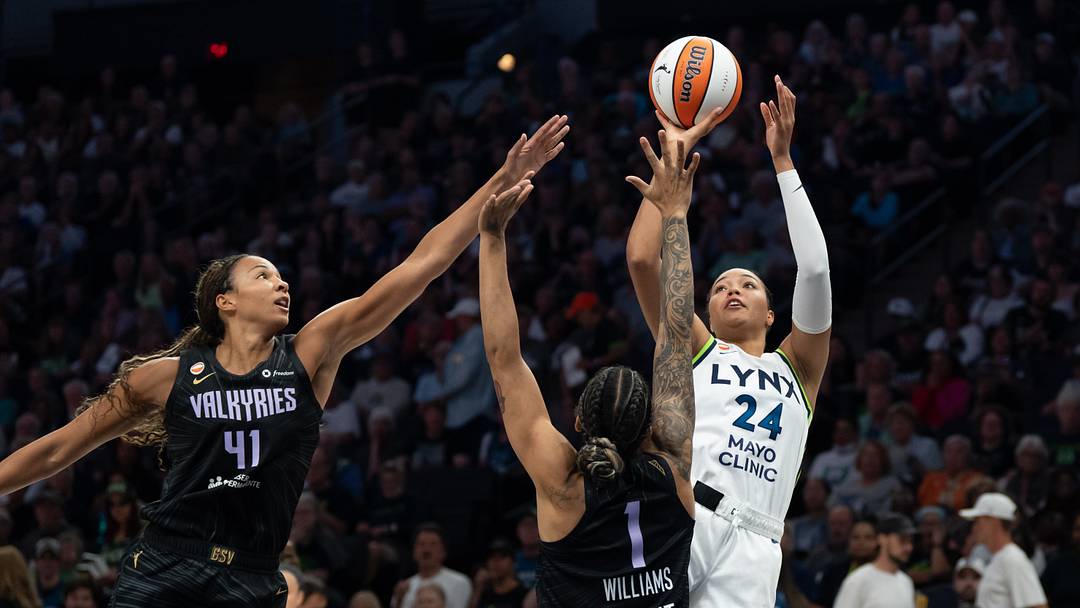 Aug 24, 2026; Minneapolis, Minnesota, USA;  Minnesota Lynx forward Napheesa Collier (24) shoots the ball over Golden State Valkyries center Kiah Stokes (41) and Golden State Valkyries forward Gabby Williams (1) in the second half at Target Center.  Mandatory Credit: Jesse Johnson-Imagn Images
