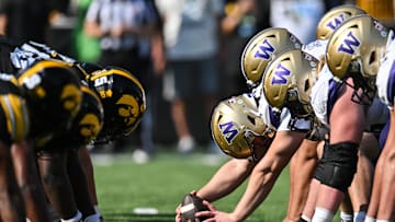Oct 12, 2024; Iowa City, Iowa, USA; The line of scrimmage between the Iowa Hawkeyes and the Washington Huskies during the second quarter at Kinnick Stadium. Mandatory Credit: Jeffrey Becker-Imagn Images