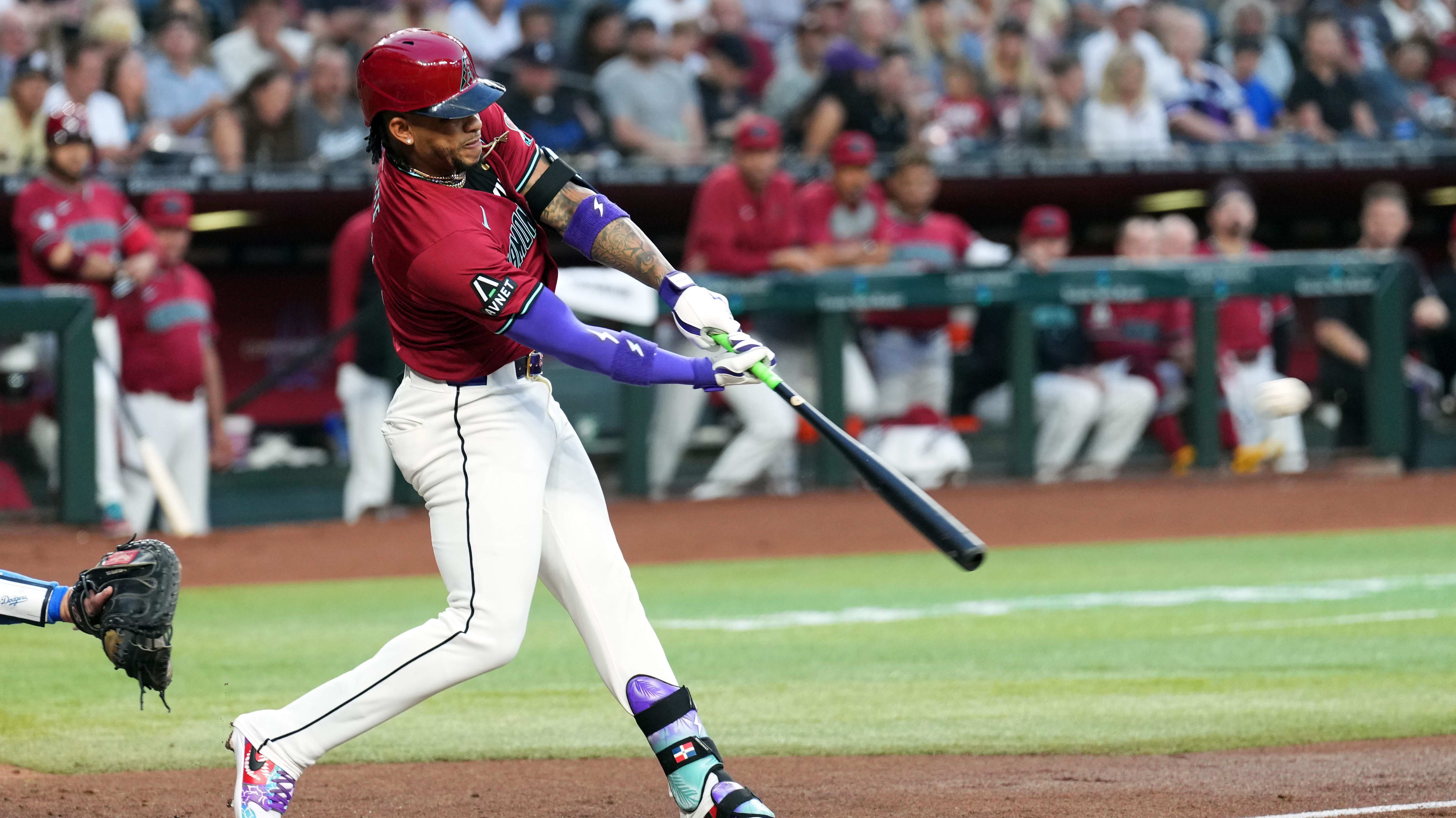 Apr 29, 2024; Phoenix, Arizona, USA; Arizona Diamondbacks second base Ketel Marte (4) hits a double